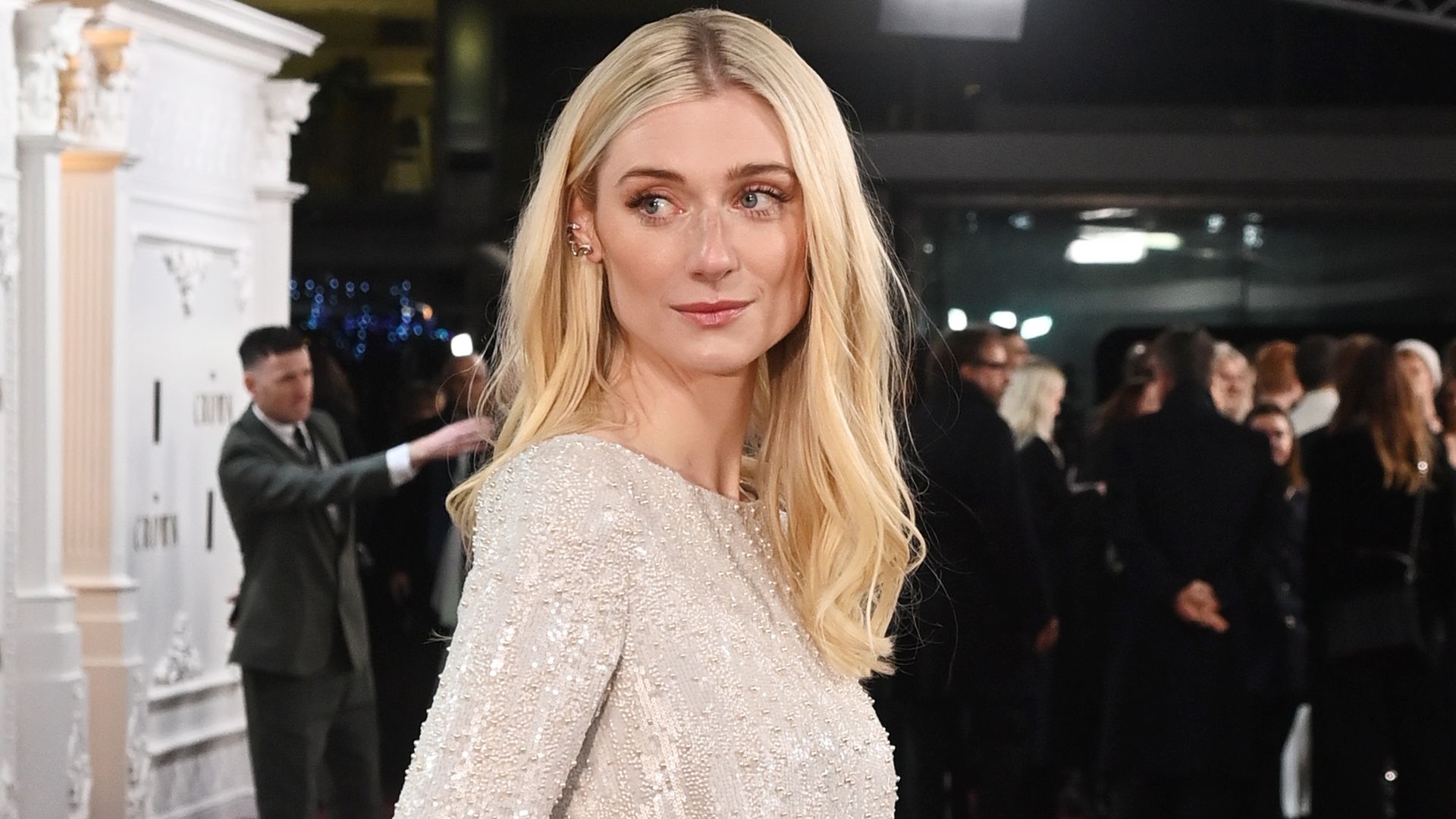 Elizabeth Debick in a silver dress