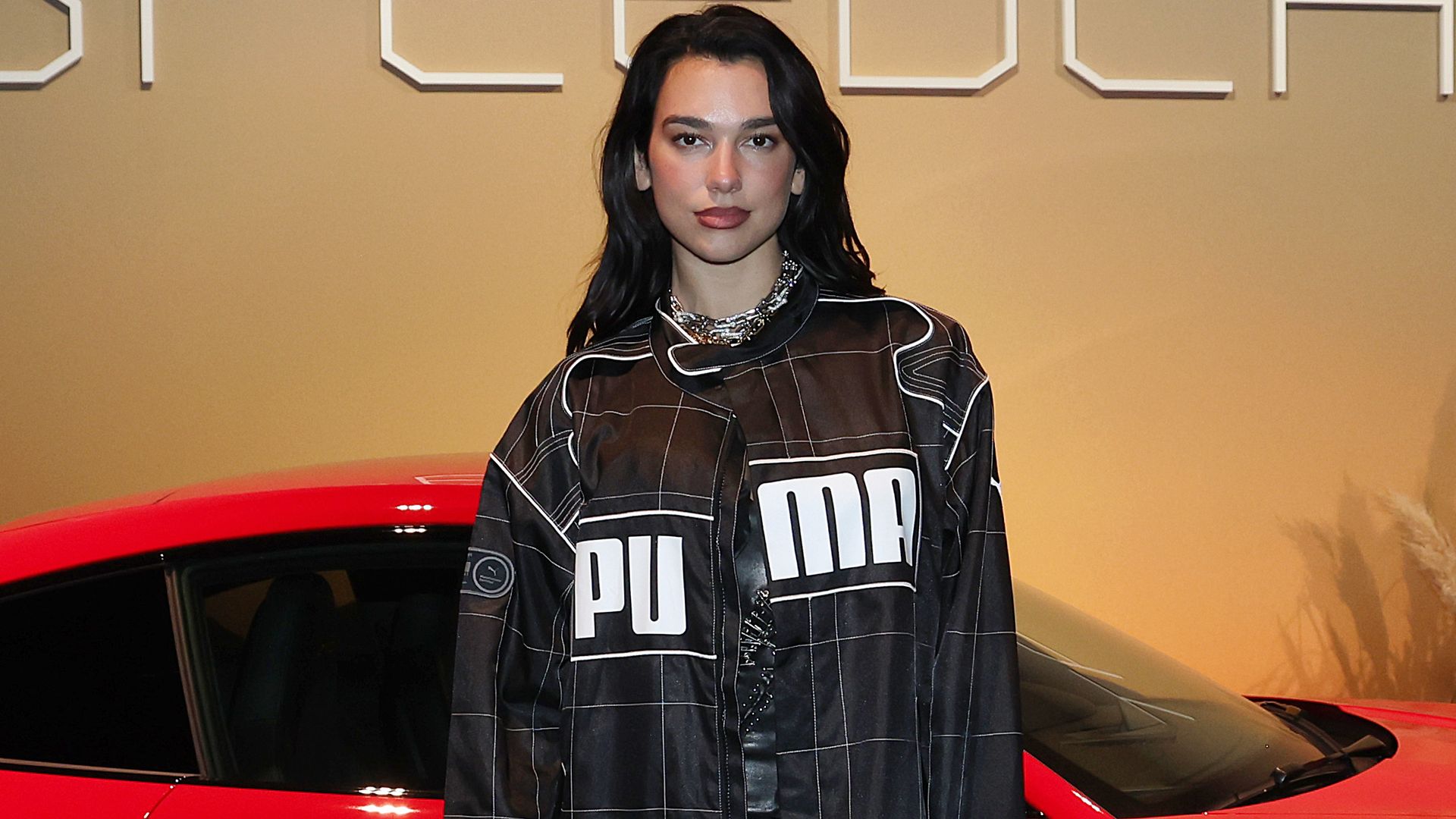 Dua Lipa is the ultimate biker babe in graphic leather jacket