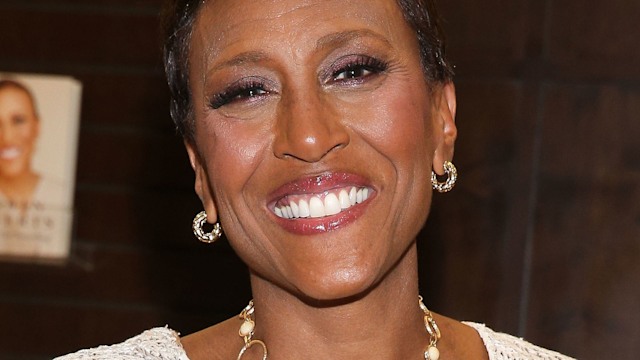 Robin Roberts wearing a white dress 