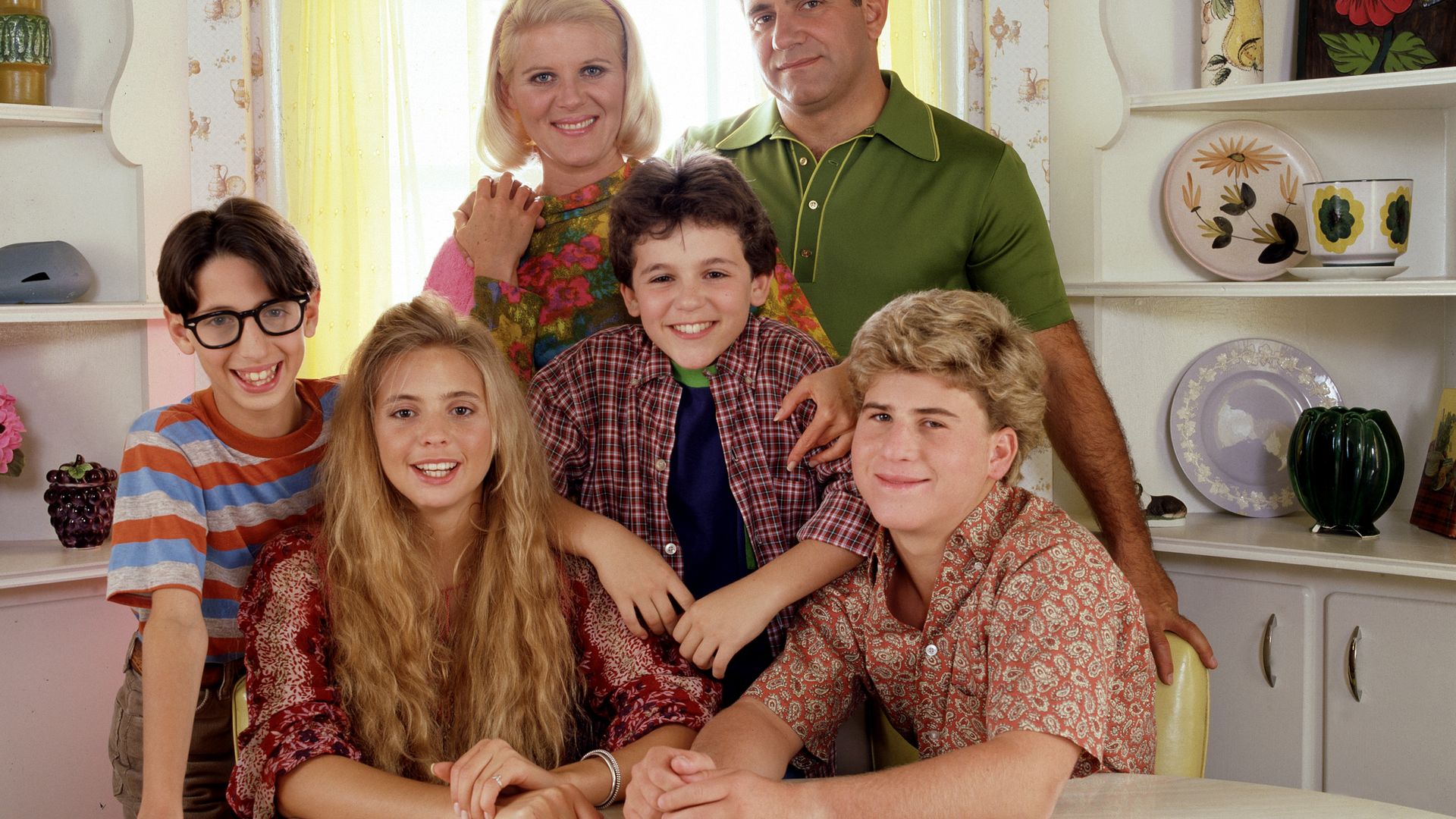 Pre-teen Kevin Arnold (Fred Savage, center) learns about life and love growing up in suburban America in the late 1960 in The Wonder Years.