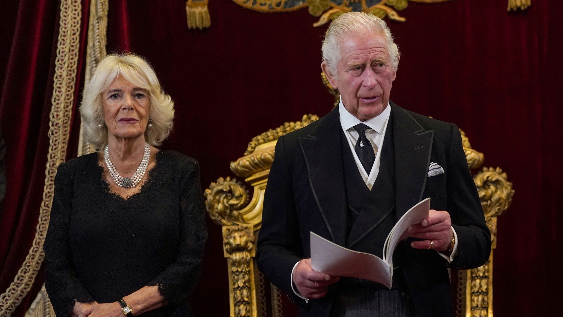 King Charles and Queen Consort Camilla in black