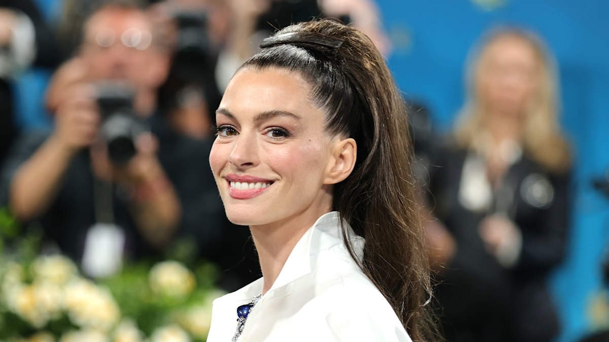 Anne Hathaway's versatile button-up shirt is a wardrobe hero like no other