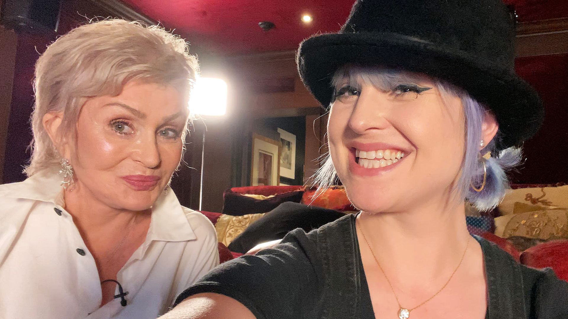 Sharon and Kelly Osbourne posing for a selfie