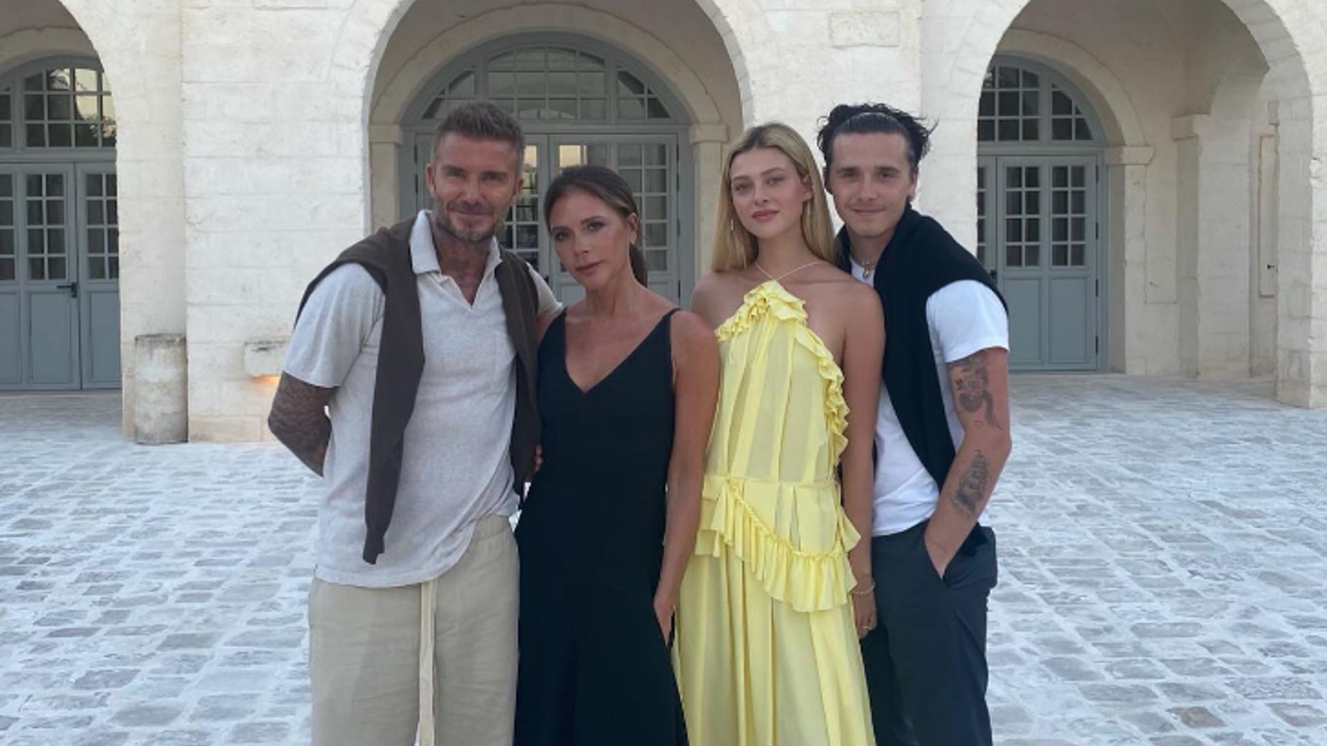 David and Victoria Beckham pose with Brooklyn and Nicola Peltz