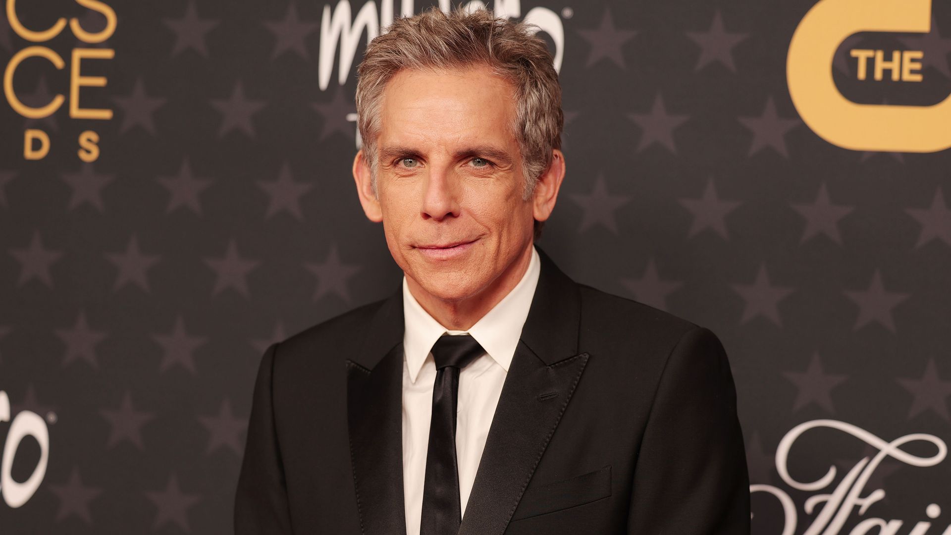 Ben Stiller in black tie and suit