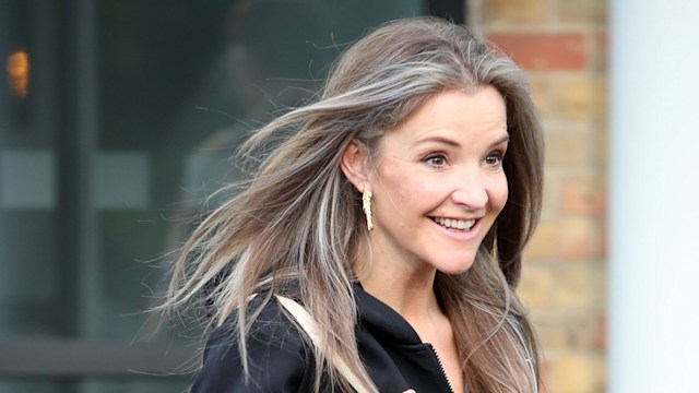 Helen Skelton walking with a bag