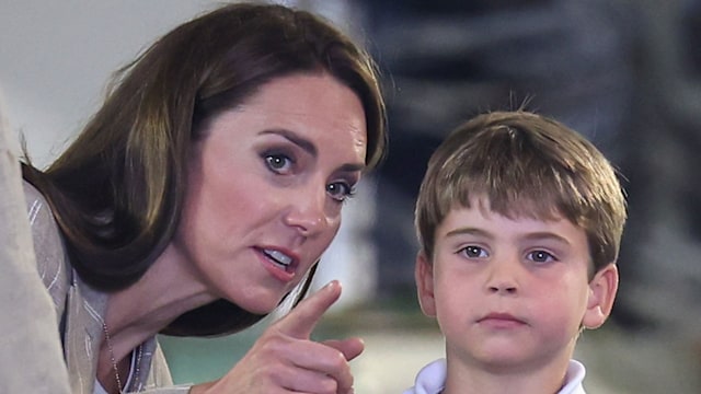 Prince Louis of Wales sits inside a vehicle on a C17 plane with his mother Princess Kate