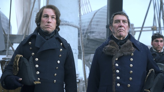 two sailors standing on ship