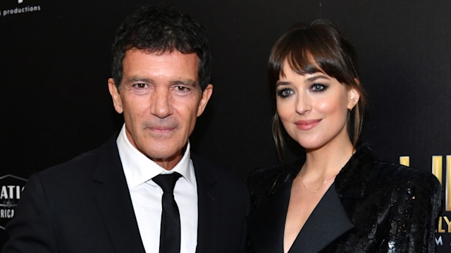 Antonio Banderas, winner of the Hollywood Actor Award, and Dakota Johnson pose in the press room during the 23rd Annual Hollywood Film Awards at The Beverly Hilton Hotel on November 03, 2019 in Beverly Hills, California