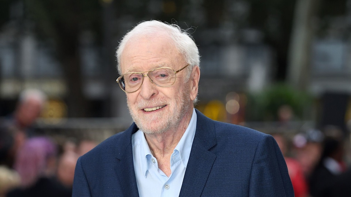 Michael Caine, 92, uses wheelchair to accept award in rare public appearance as wife and daughters support star