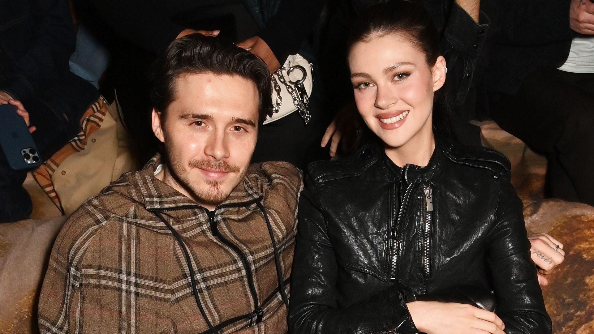 Brooklyn Beckham and Nicola Peltz attend the Burberry Winter 2025 show 