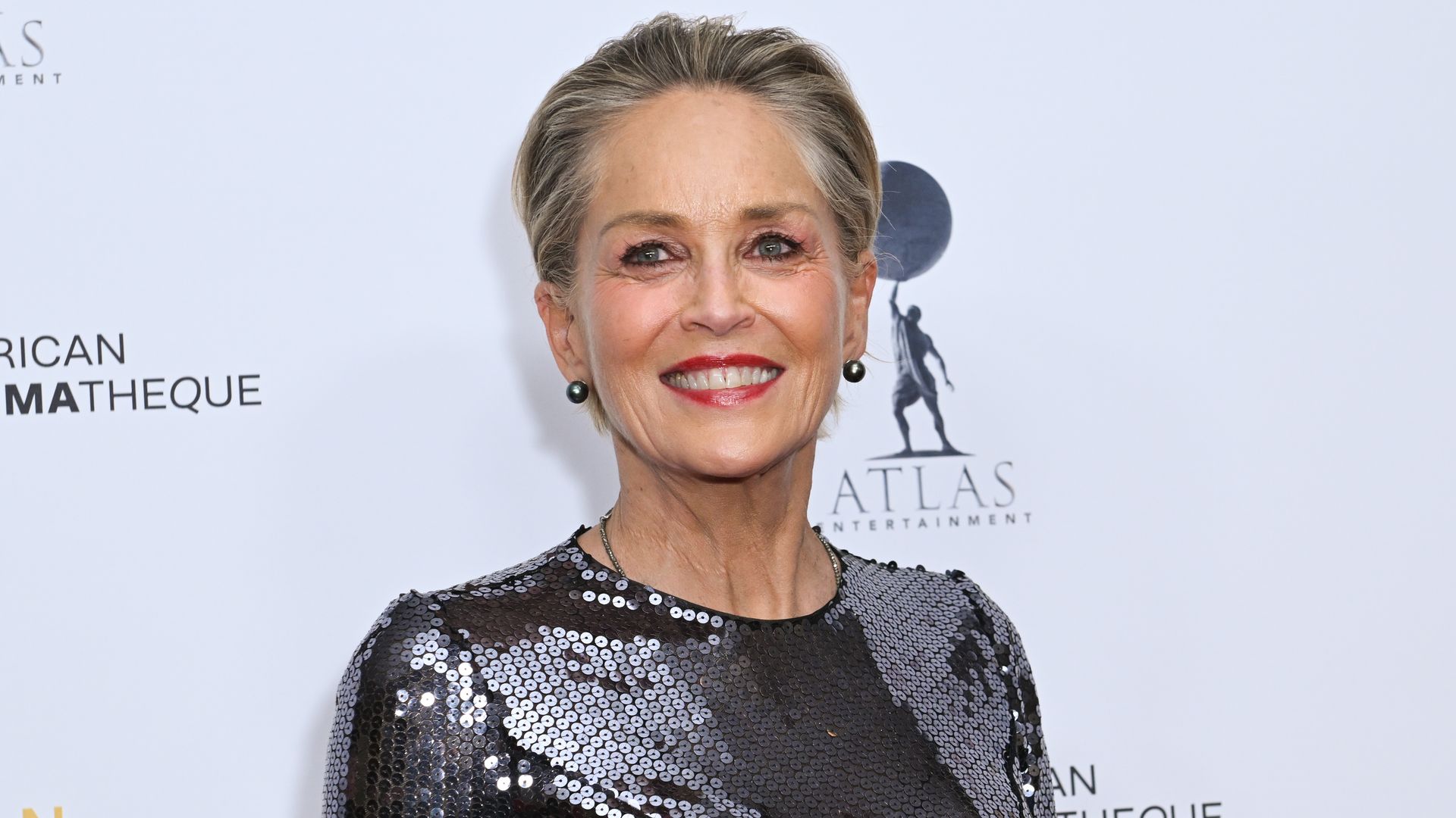 Sharon Stone sparkles in sequin bodycon dress for Hollywood gala