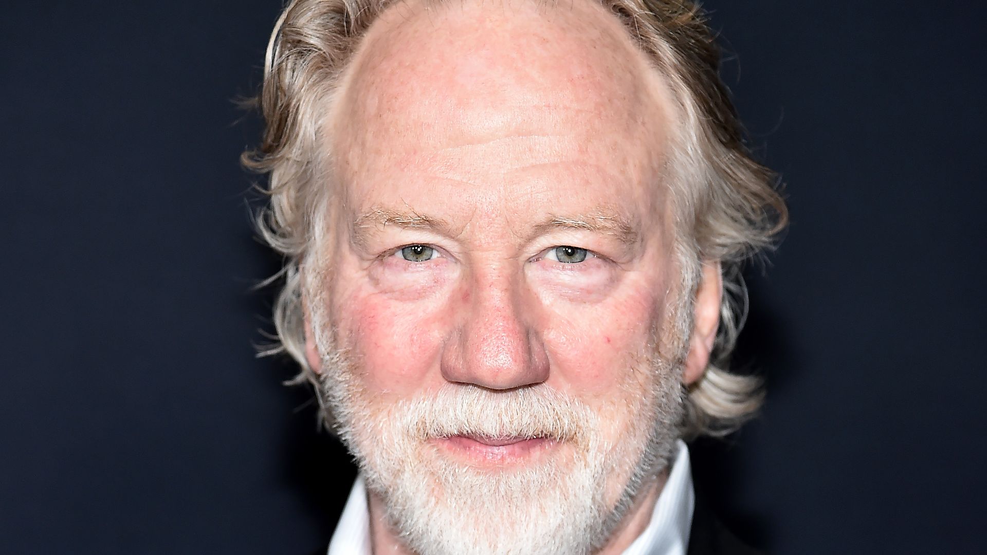 Timothy Busfield white shirt and suit