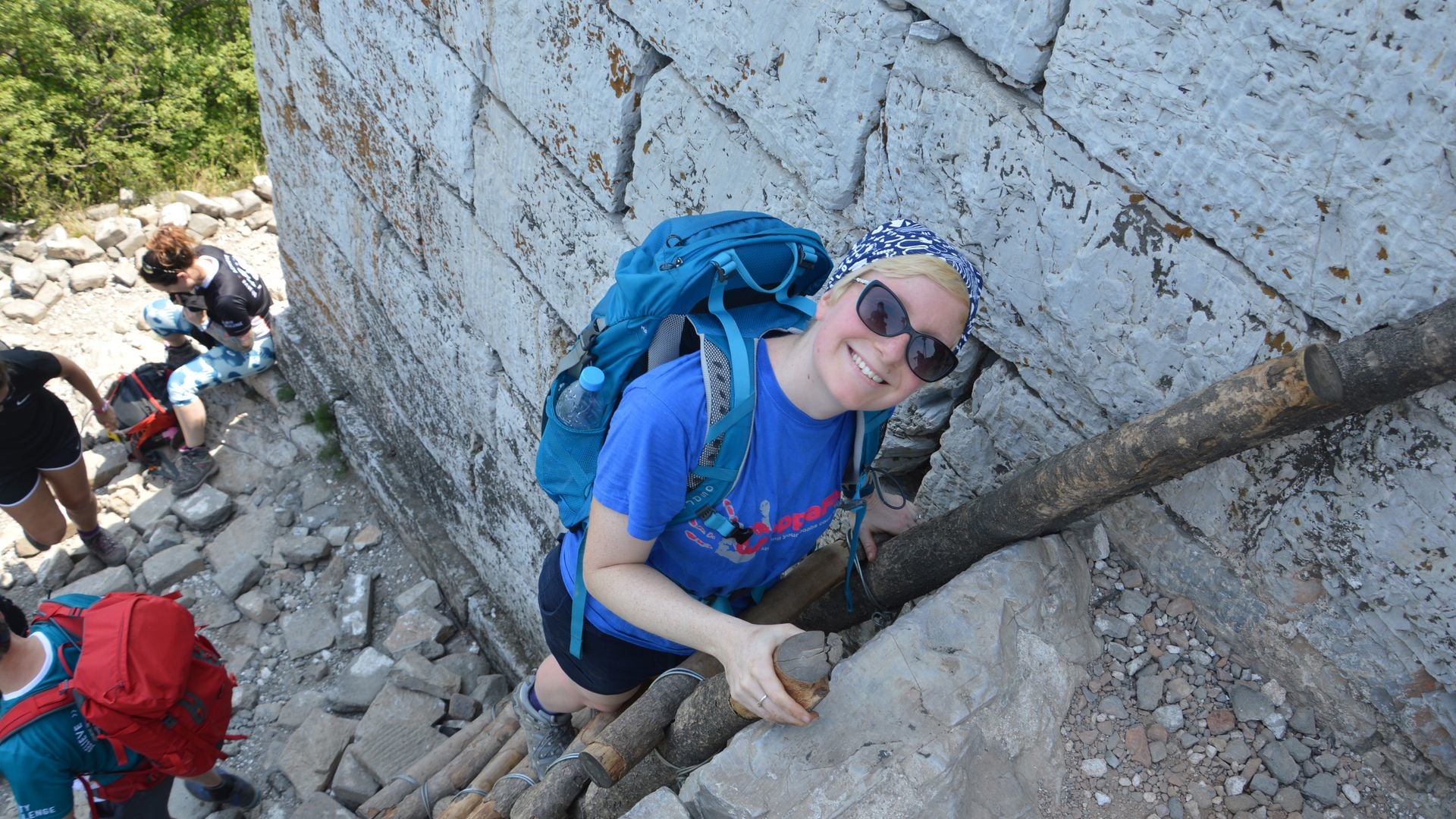 Woman climbing the Great Wall of China