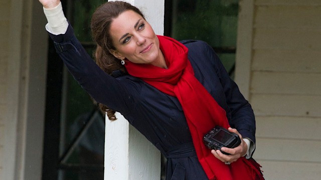 kate middleton holding camera