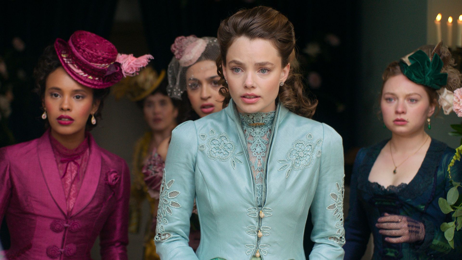 Five women stand looking shocked