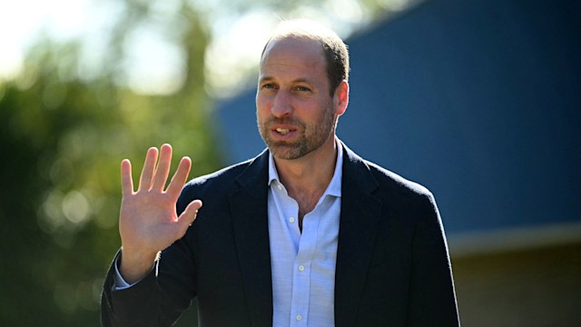 Britain's Prince William, Prince of Wales, waves upon his arrival to visit Birtley Community Pool 