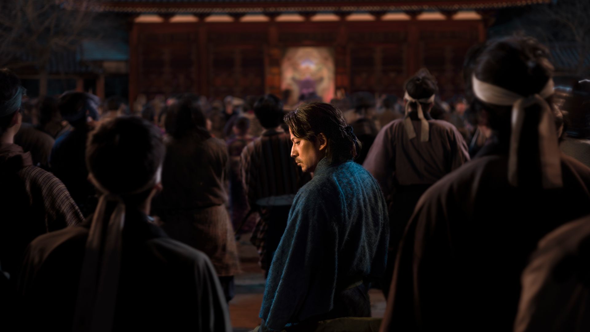 A character in Last Samurai Standing in a large crowd