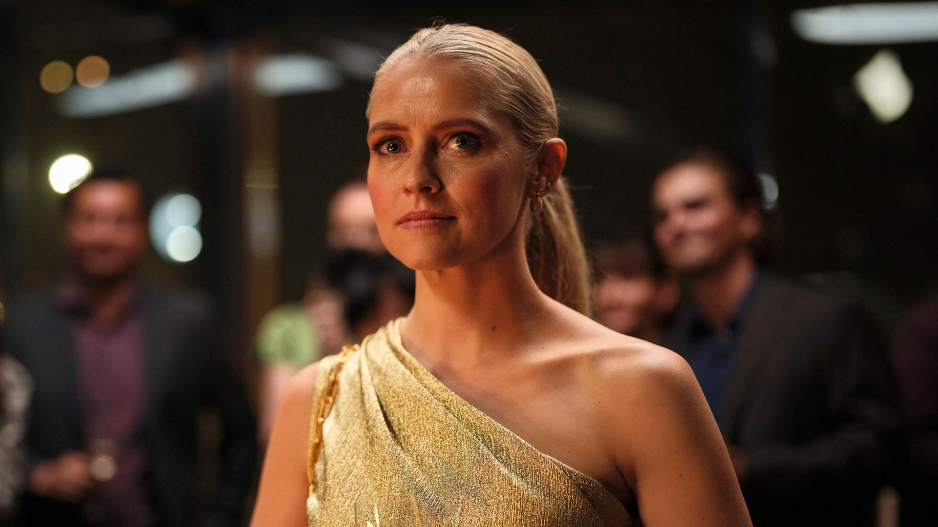 woman in dress holding champagne 