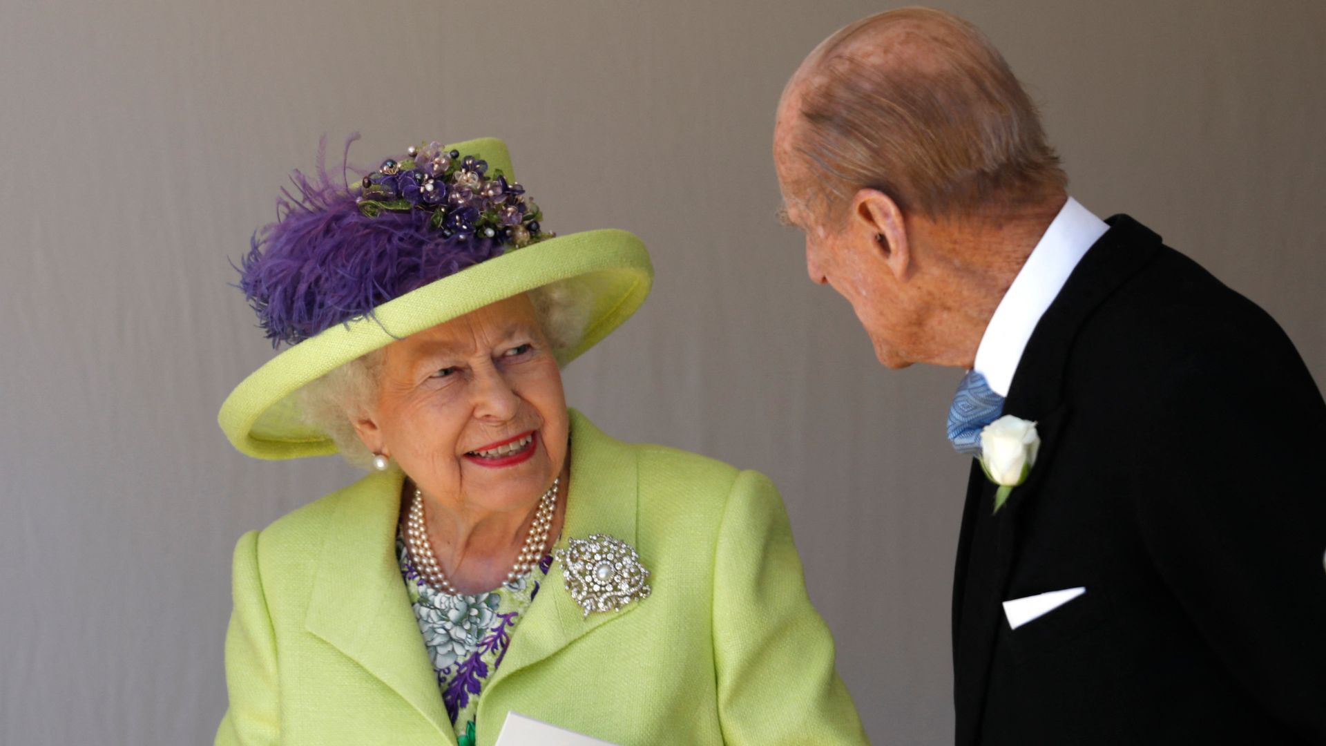 Queen Elizabeth II talking with Prince Philip 