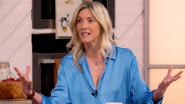 Lisa Faulkner wears a blue blouse