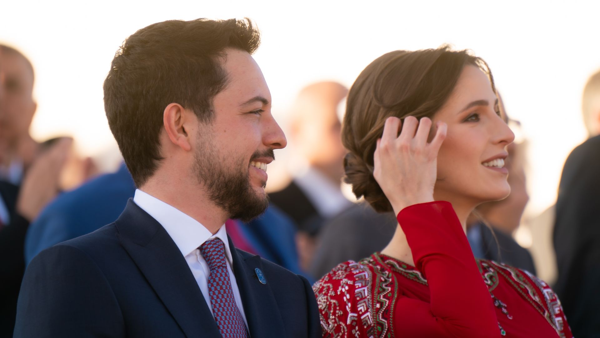 Princess Rajwa displays growing baby bump in stunning red gown at King Abdullah's Silver Jubilee