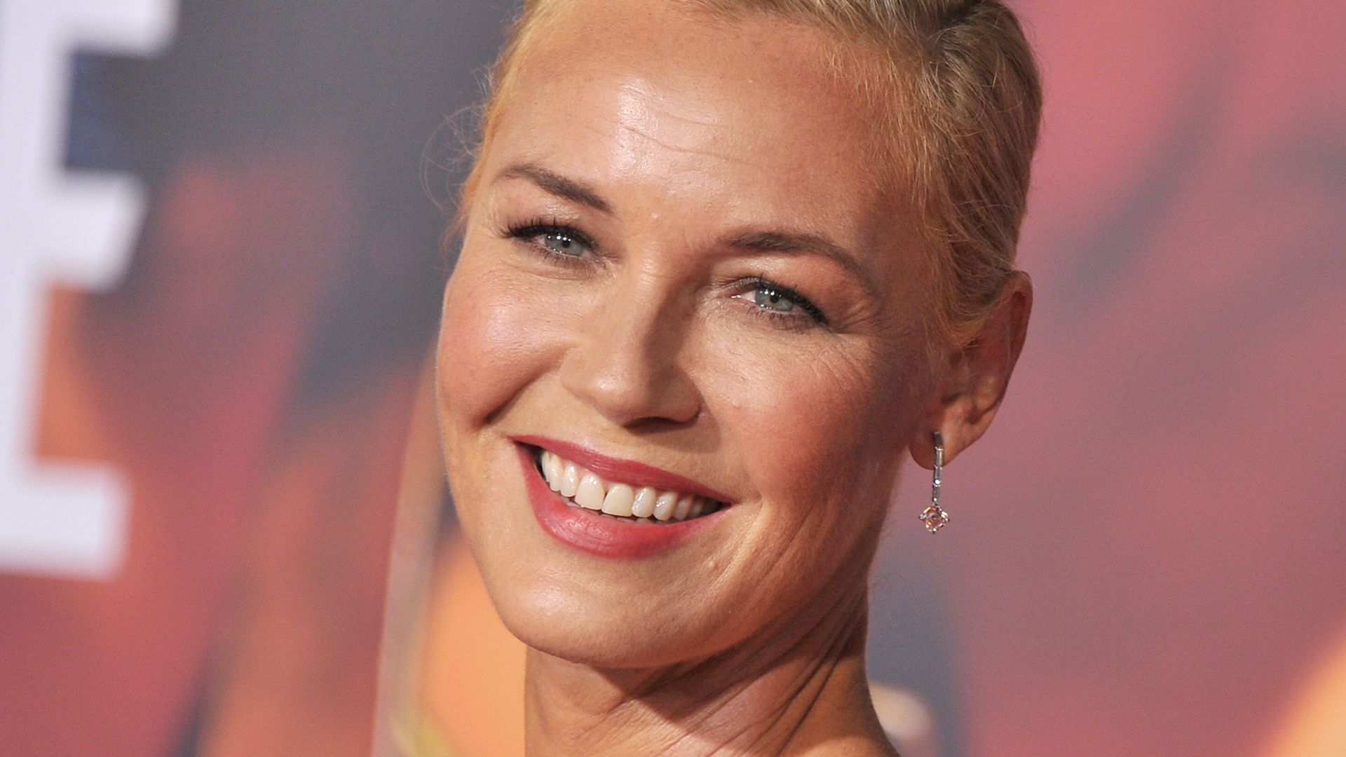 Connie Nielsen, 59, rocks retro power suit ahead of big screen comeback