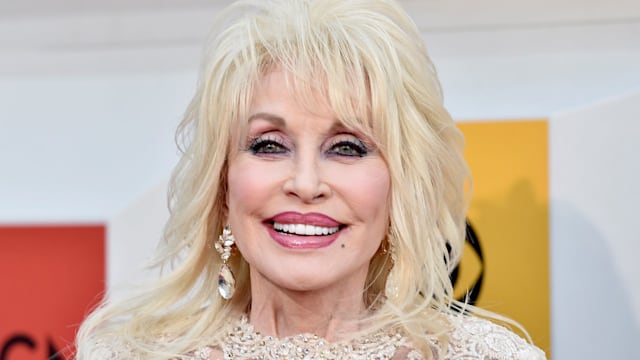 Dolly Parton in a white embellished dress