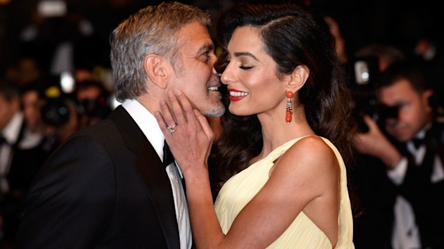 Actor George Clooney and his wife Amal Clooney attend the "Money Monster" premiere during the 69th annual Cannes Film Festival at the Palais des Festivals on May 12, 2016 in Cannes, France