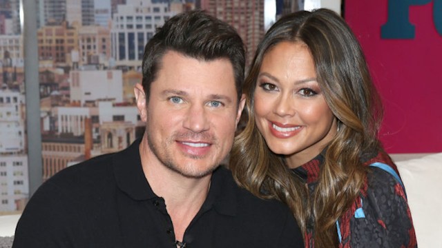 Nick Lachey and Vanessa Lachey cuddle up for a photo while visiting People Now on February 05, 2020 in New York