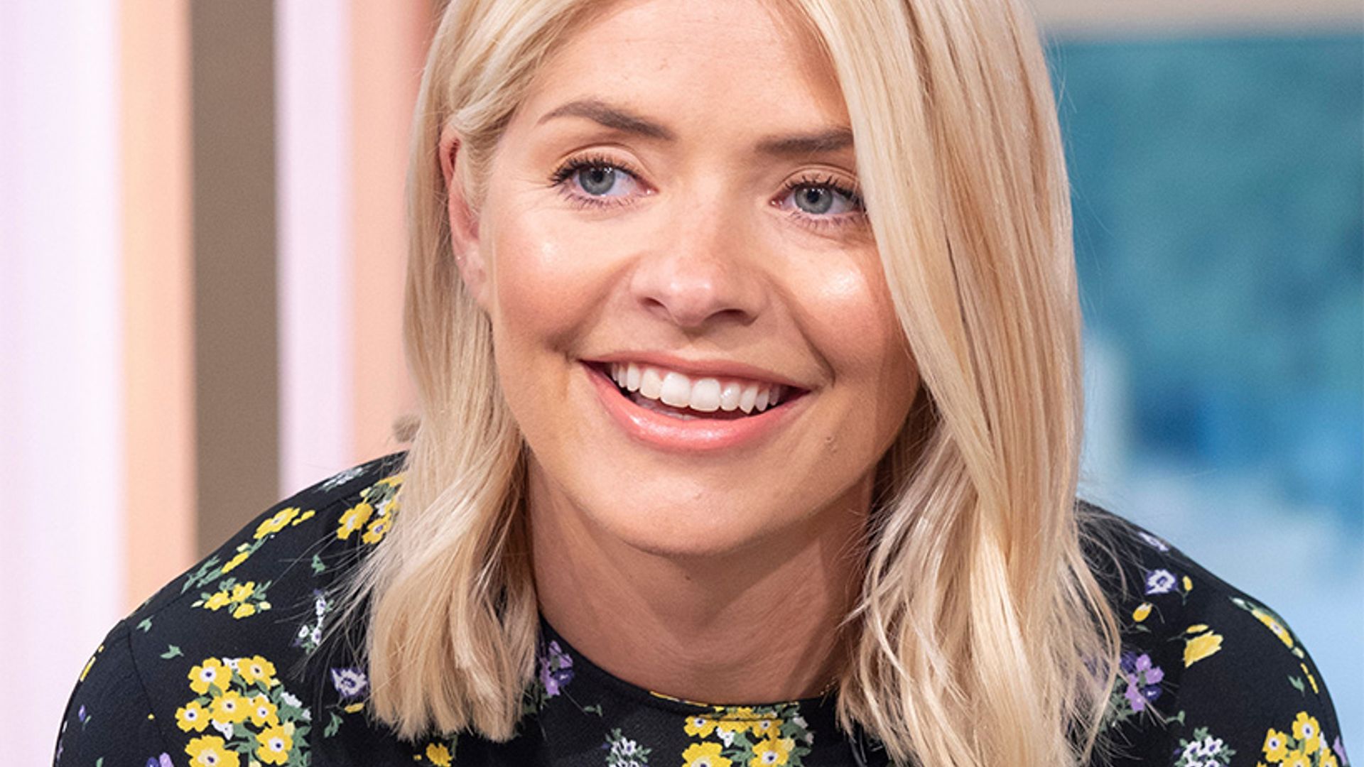 holly willoughby black trousers black floral top this morning
