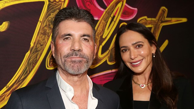 Simon Cowell and Lauren Silverman pose at the opening night of the new musical "& Juliet" on Broadway at The Stephen Sondheim Theatre on November 17, 2022 in New York City