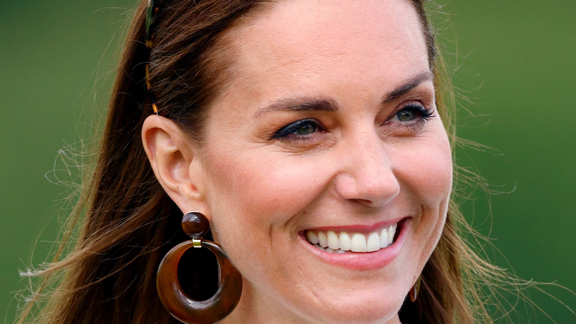 Kate Middleton, the Princess of Wales attends the Out-Sourcing Inc. Royal Charity Polo Cup at Guards Polo Club, Flemish Farm on July 6, 2022 in Windsor, England.