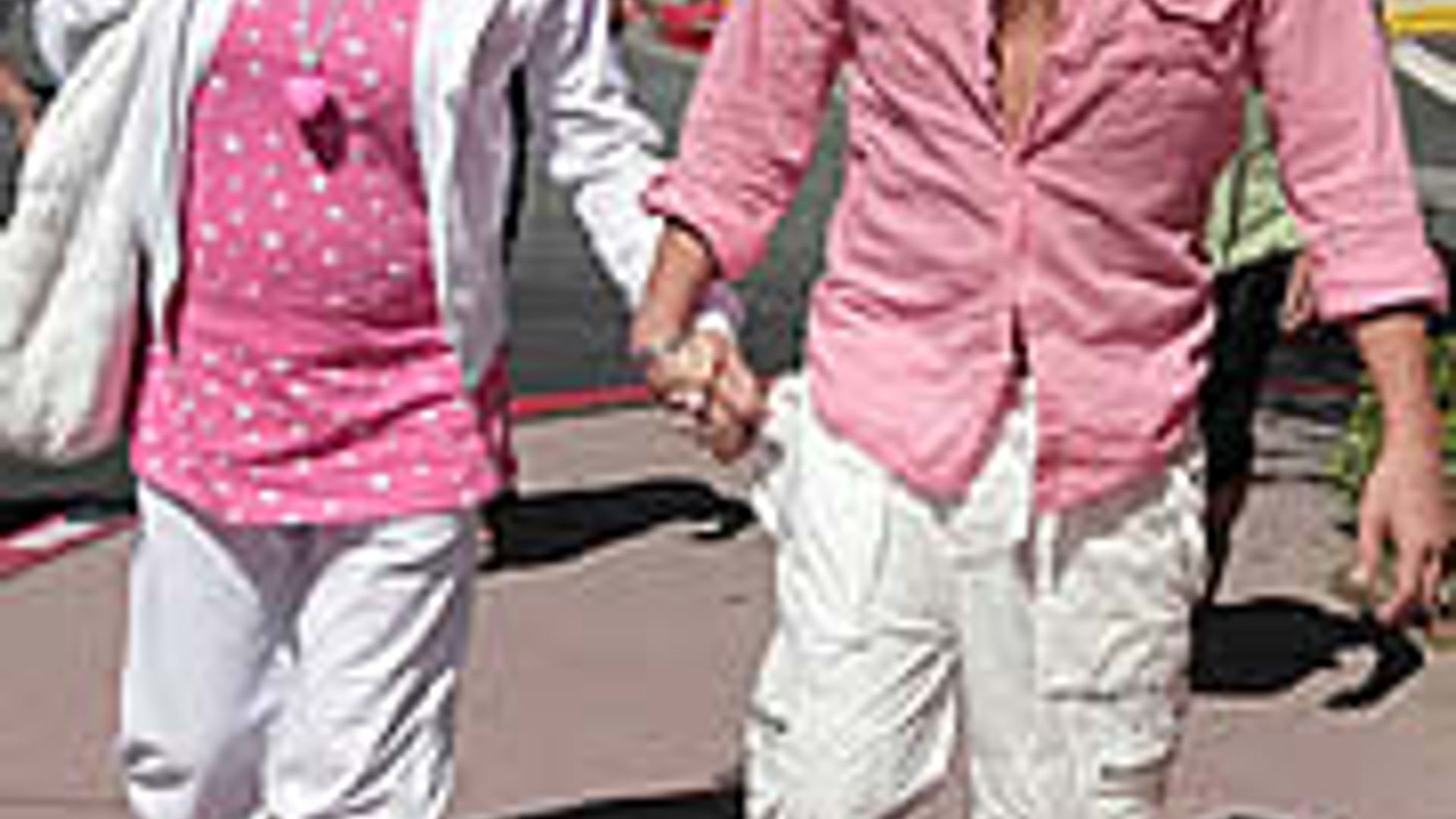 Expectant parents Katie and Pete coordinate in baby pink HELLO!