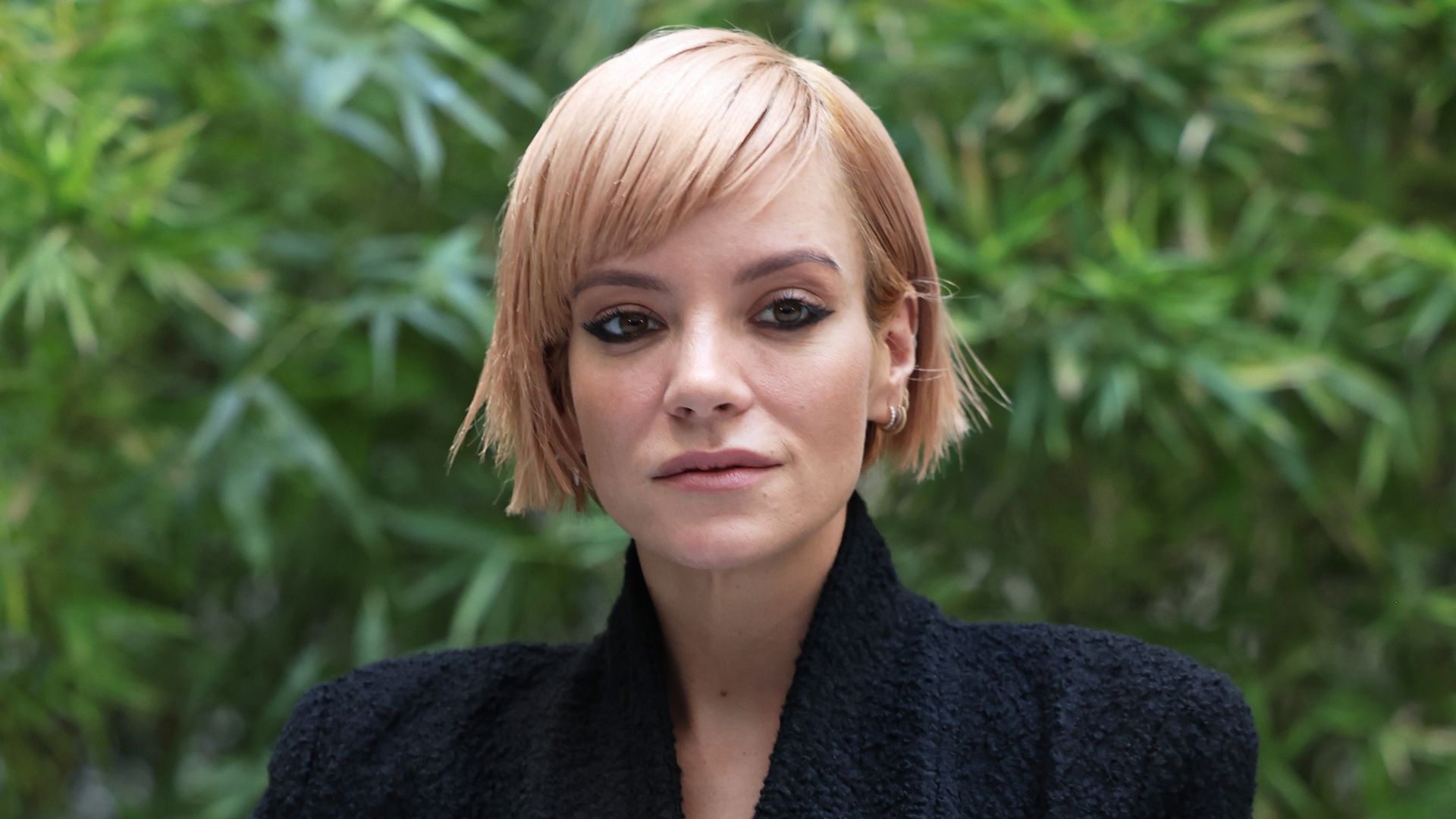 Lily Allen smouldering in a close-up photo 