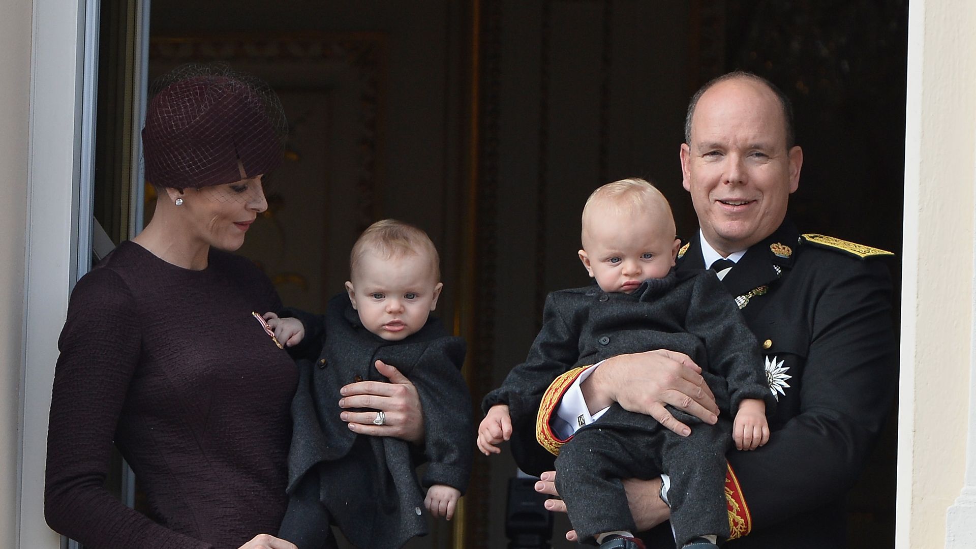 family with twins on balcony