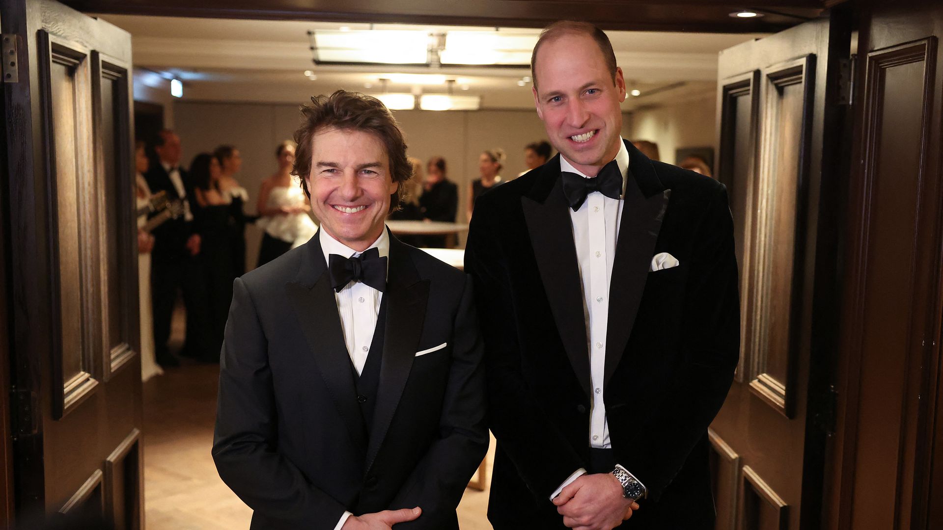 Britain's Prince William, Prince of Wales poses for a photo with US actor Tom Cruise at the London Air Ambulance Charity Gala Dinner at The OWO in central London, on February 7, 2024. (Photo by Daniel LEAL / POOL / AFP) (Photo by DANIEL LEAL/POOL/AFP via Getty Images)