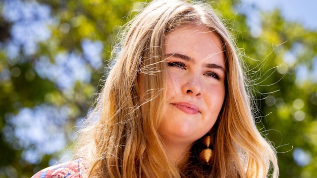 Princess Amalia wearing red floral dress on Caribbean tour