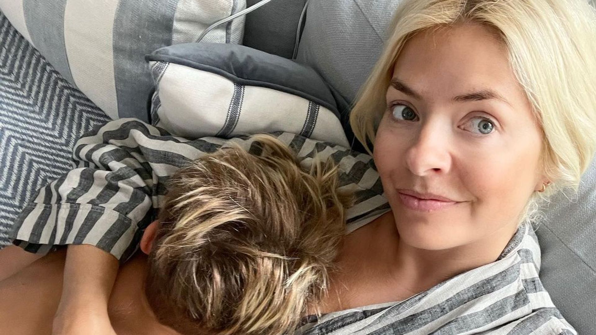 Holly Willoughby takes a selfie while hugging her son Chester