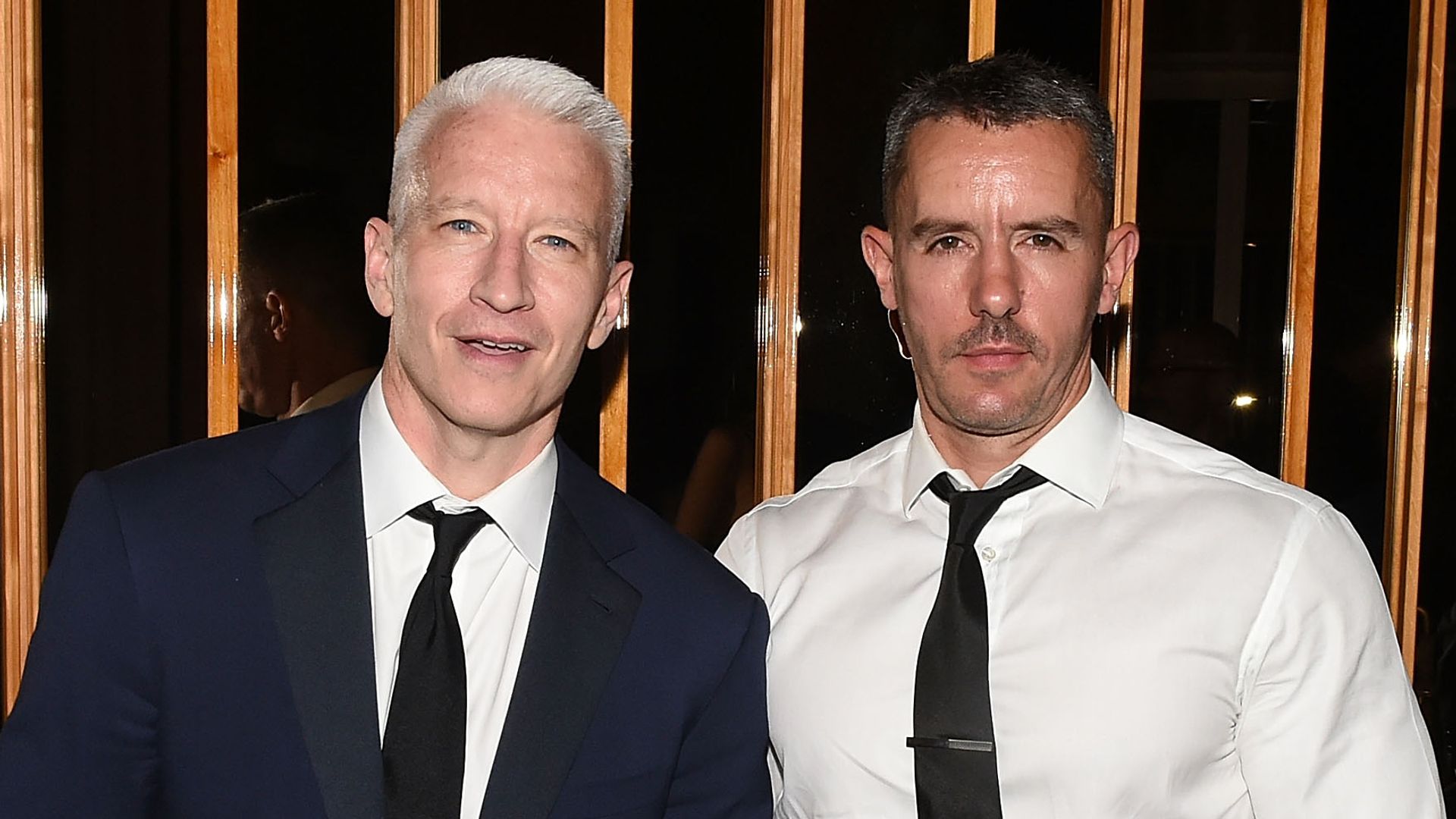 Anderson Cooper and Benjamin Maisani attend the 2015 amfAR Inspiration Gala  after party at Boom Boom Room on June 16, 2015 in New York City