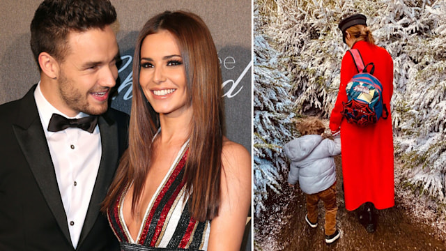 Cheryl and Liam smiling and Cheryl holding Bear's hand through Christmas trees