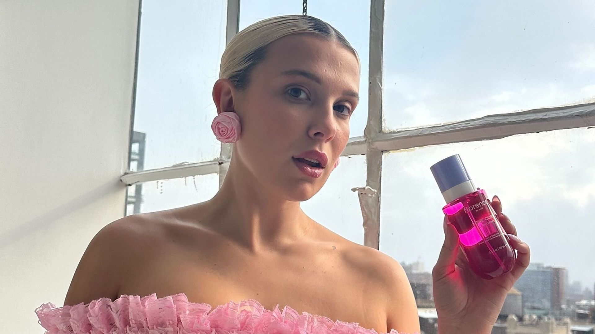 Millie Bobby Brown poses in a pink dress on her Instagram