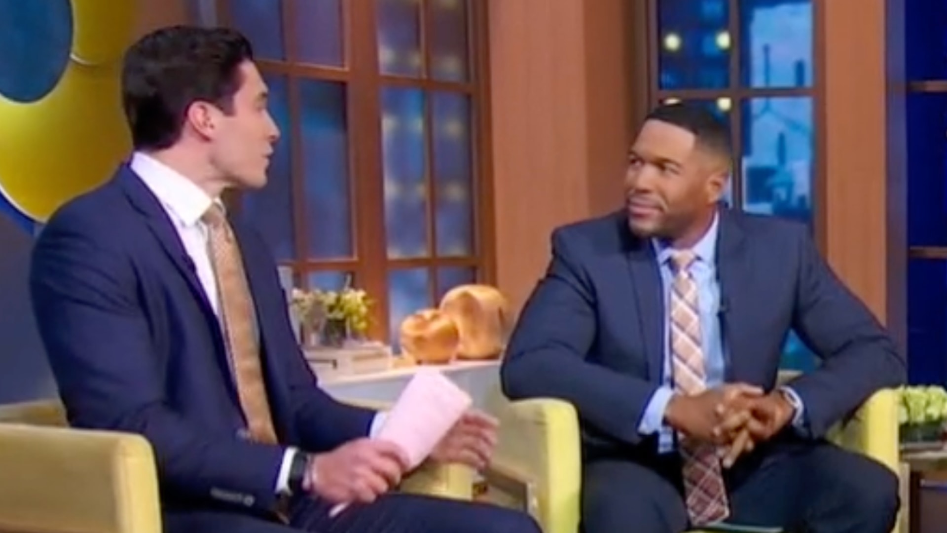 Michael Strahan and Will Reeve on GMA looking at one another