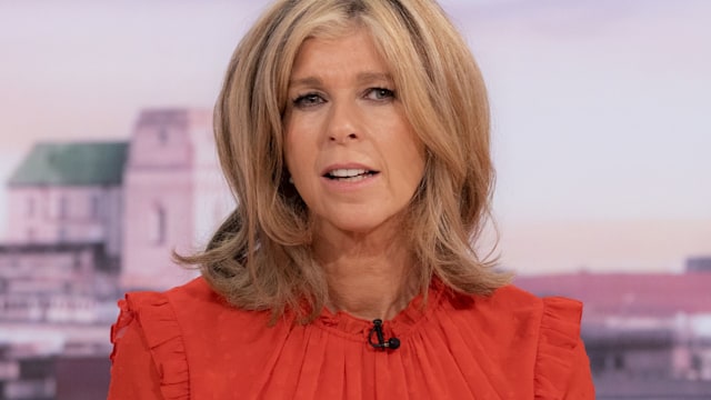 Kate Garraway in orange dress on GMB