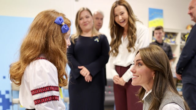 Kate Middleton speaks with Liza, 8, at Vsi Razom