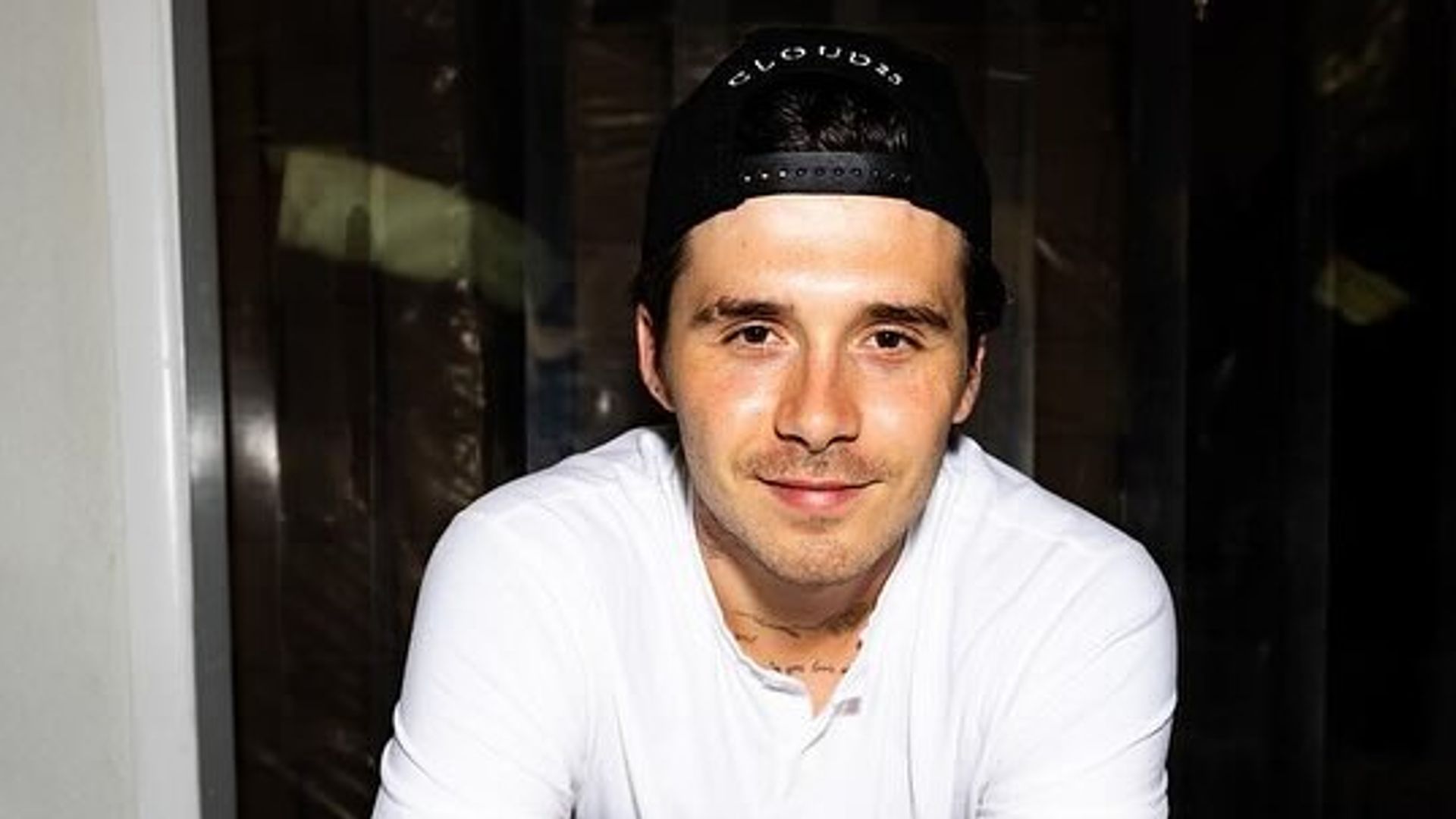 Brooklyn Beckham proves electric blue is his colour while celebrating major milestone moment