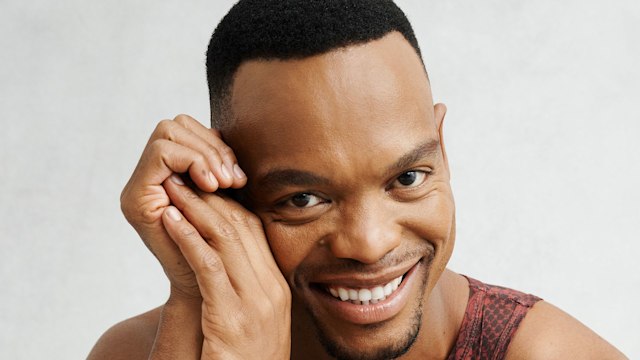 Strictly Come Dancing's Johannes Radebe smiles to the camera