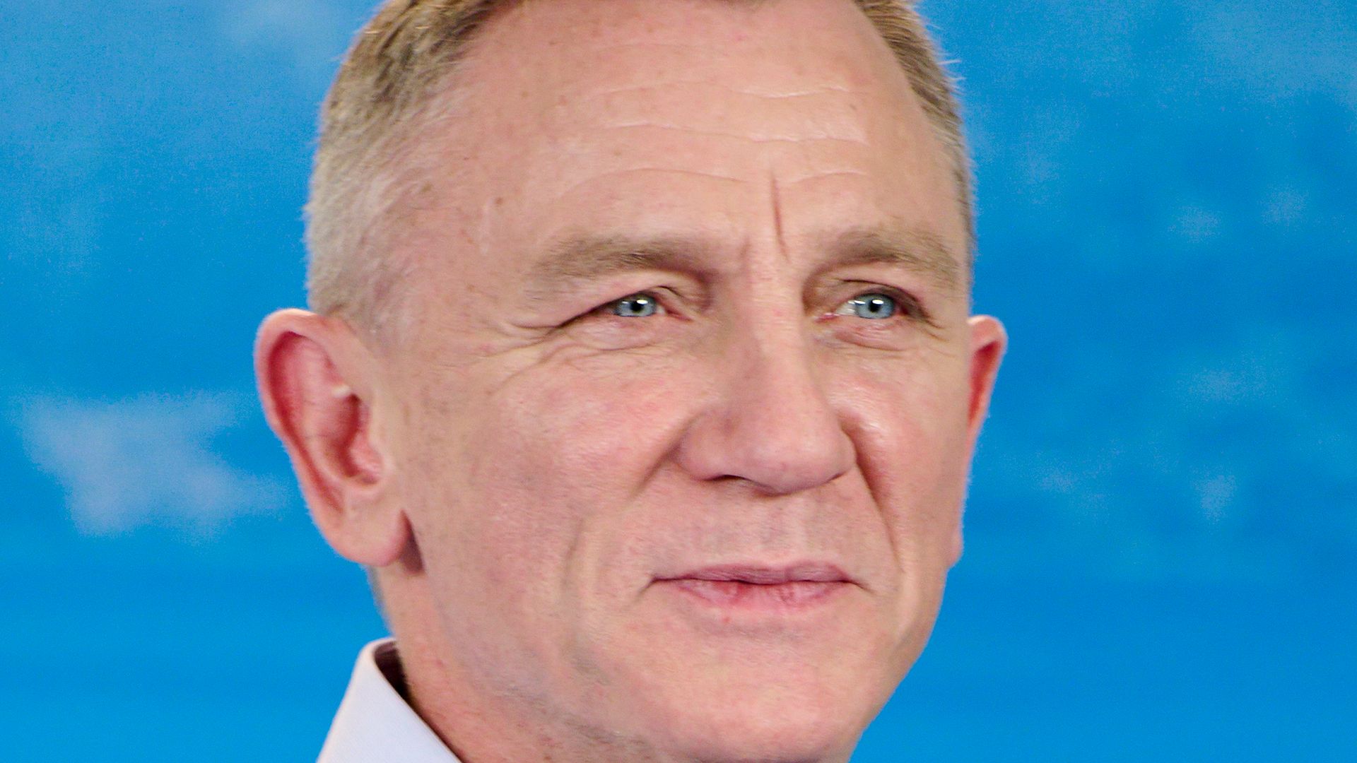 Daniel Craig debuts slick new hair transformation and dashing beard