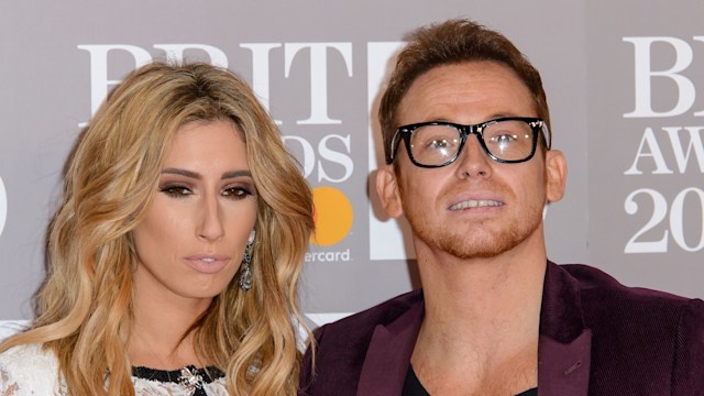 Stacey Solomon and Joe Swash with blank expressions at the BRITs