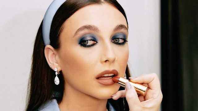 Emma Chamberlain sports a bold blue eye look to the Met Gala 2023, perfectly matching her all-blue Miu Miu look